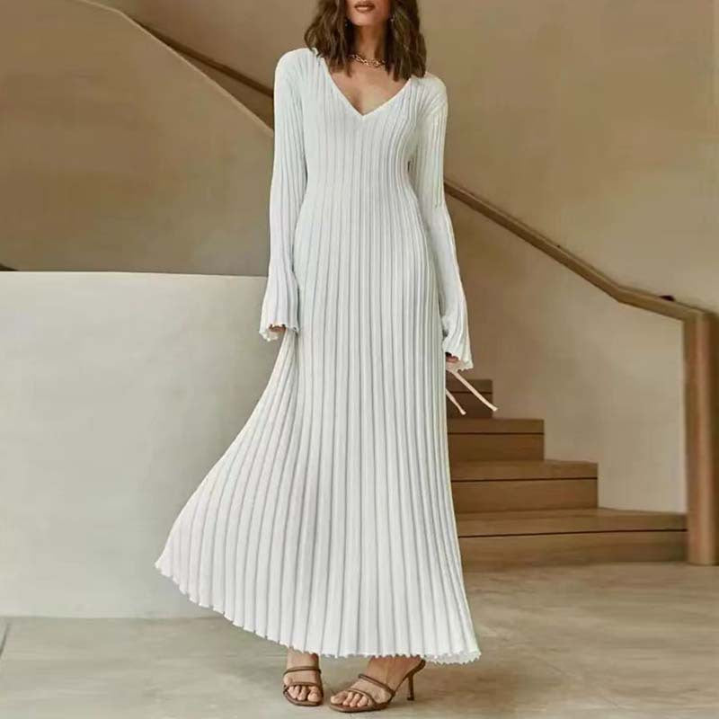V-neck flared long-sleeved knit dress with elegant vertical stripes