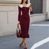 New color-blocked cuff fitted waist long knit dress