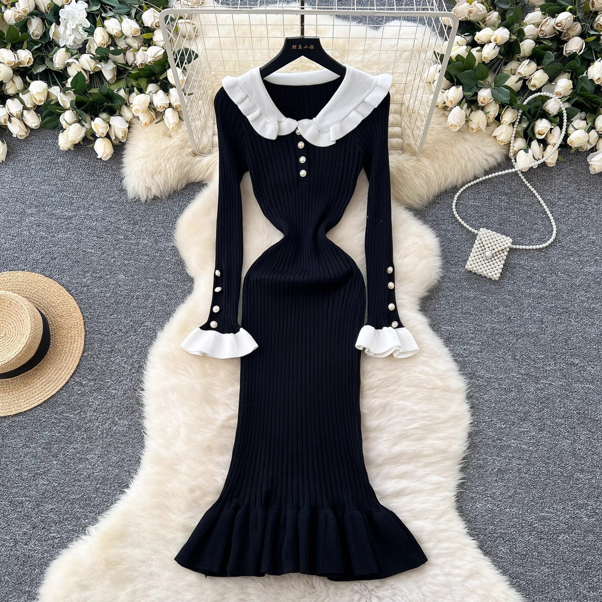 New color-blocked cuff fitted waist long knit dress